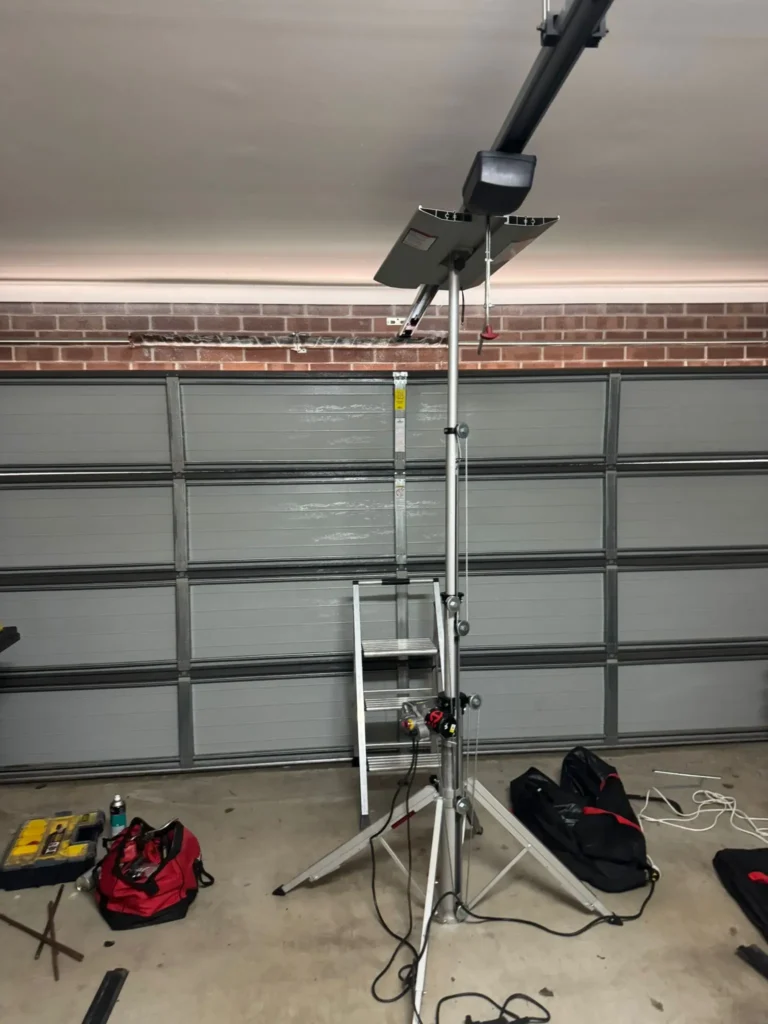 this is photo of a garage door motor being replaced